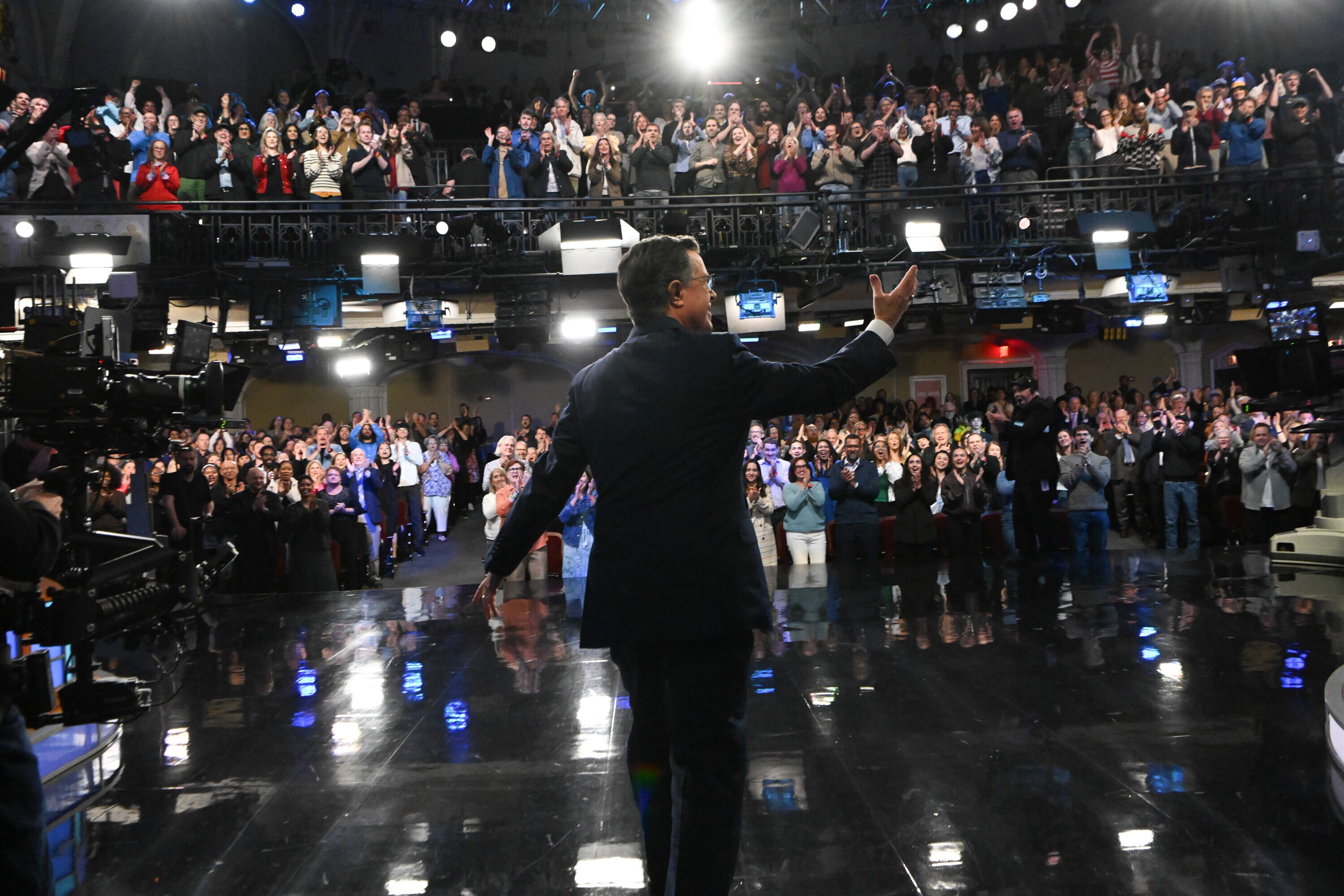 Host Stephen Colbert receives a standing ovation during Thursday night